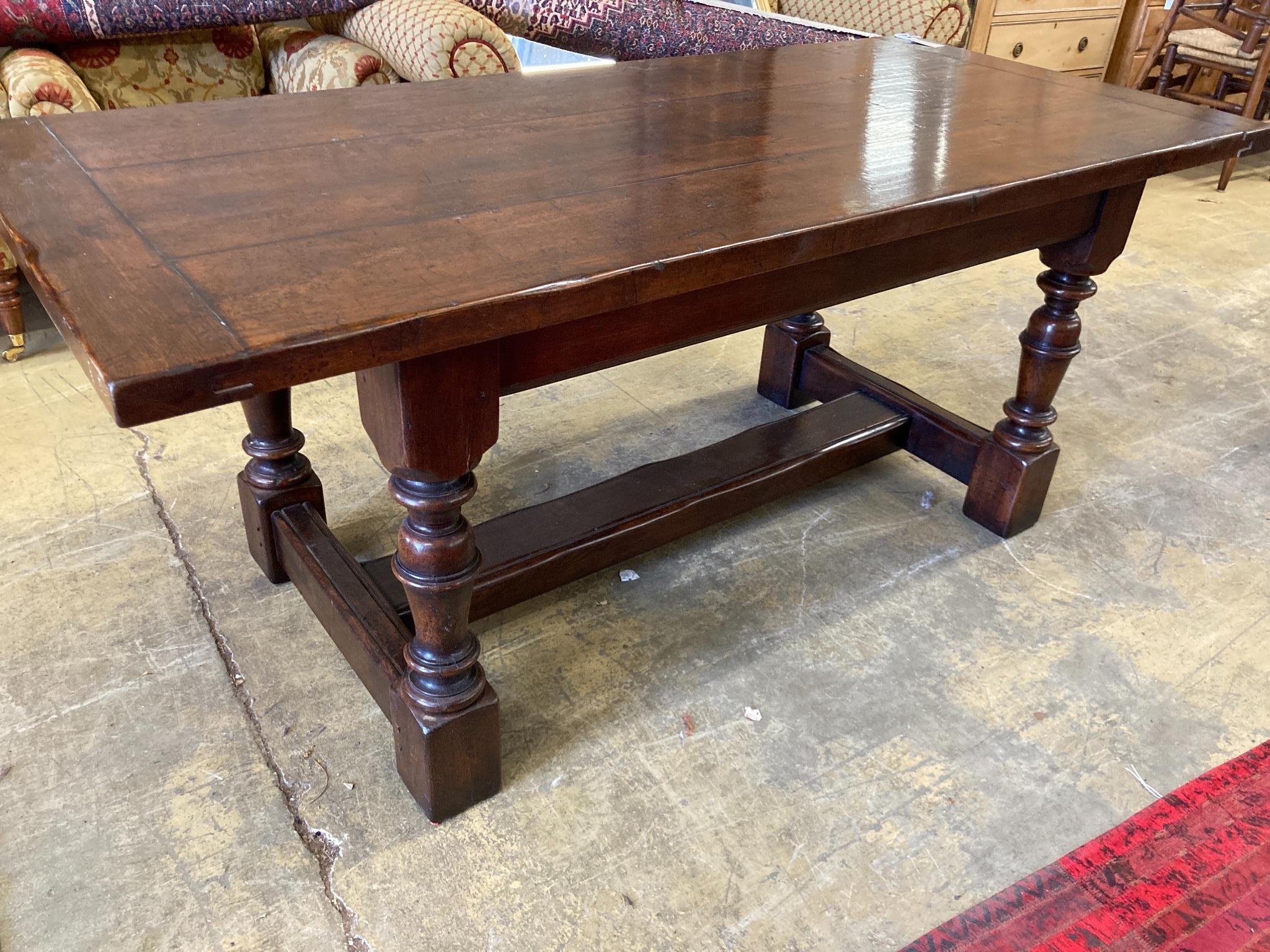 A 17th century style oak refectory table